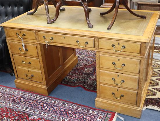 A Victorian light oak pedestal desk W.136cm